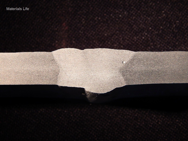 Macrography of the flat position welded joint. It was welded in three passes, with the following parameters.
Root pass - 157A, 21V, 146mm/s (wire speed), 3.2 mm/s (welding speed), 1090 J/mm.
Second pass - 161A, 21V, 146mm/s (wire speed), 4.2 mm/s (welding speed), 833 J/mm.
Third pass - 155A, 21V, 146mm/s (wire speed), 5.1 mm/s (welding speed), 664 J/mm.