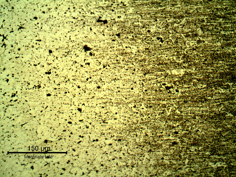 Micrography of the welded joint at the heat affected zone of the flat position, in the root.  Longitudinal section of the plate, transverse to the welded joint.