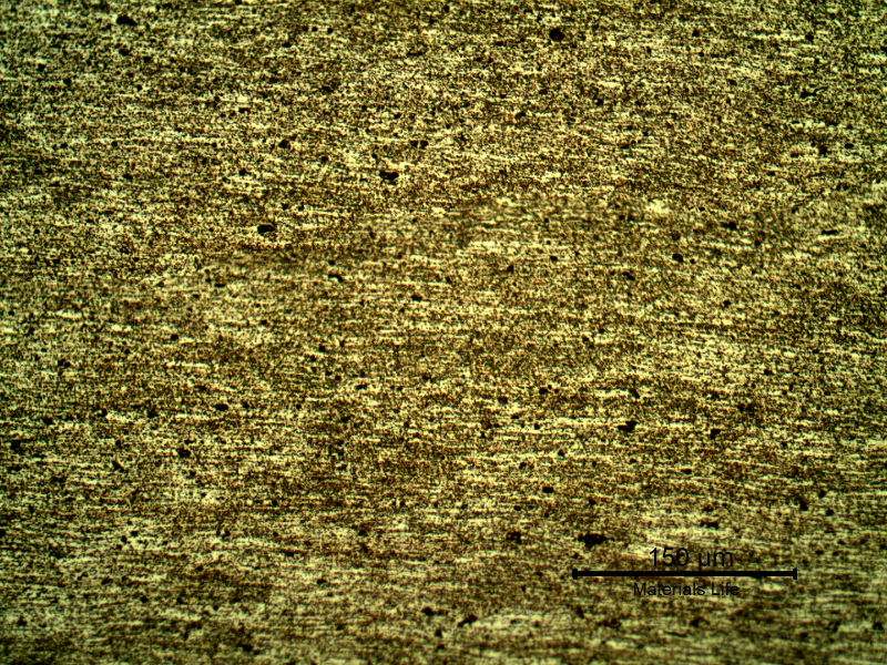 Micrography of the plate base metal, presenting granular structure evidenced by the different shadows in the grains.