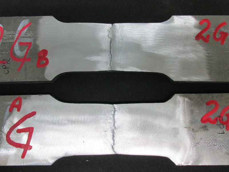 Tensile testpieces after testing. The rupture of the testpieces occurred at the margin of the weld.