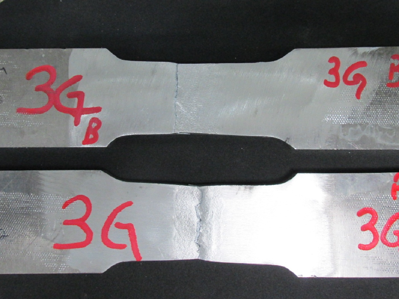Tensile testpieces after testing. The rupture of the testpieces occurred at the margin of the weld.