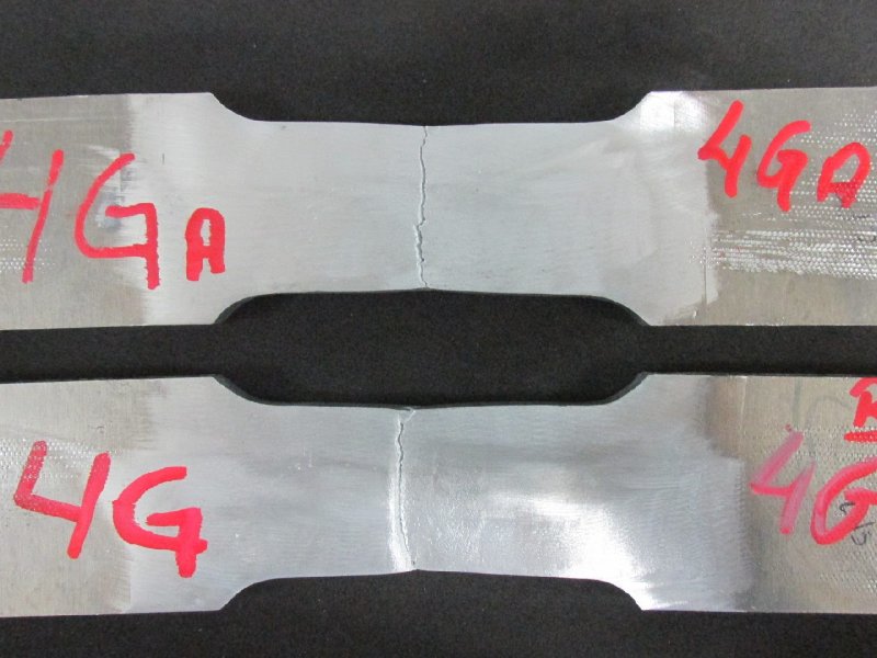 Tensile testpieces after testing. The rupture of the testpieces occurred at the margin of the weld.
