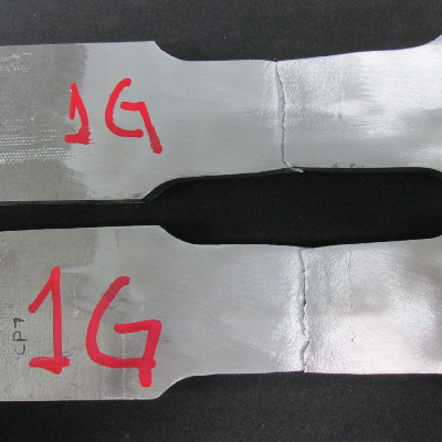 Tensile testpieces after testing. The rupture of the testpieces occurred at the margin of the weld.