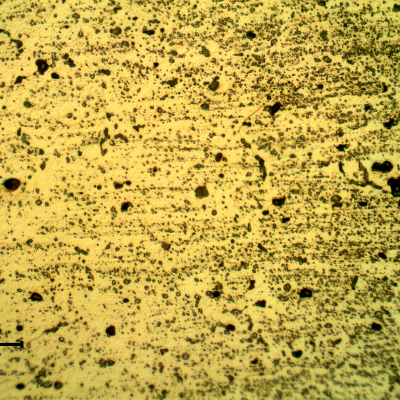 Micrographic detail of the welded joint at the heat affected zone of the flat position, in the root.  Longitudinal section of the plate, transverse to the welded joint.