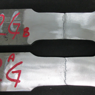 Tensile testpieces after testing. The rupture of the testpieces occurred at the margin of the weld.