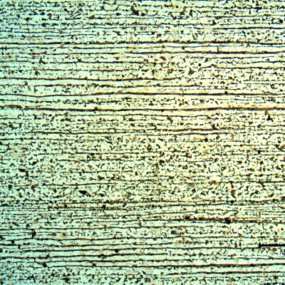 Micrography of the plate in a longitudinal section, presenting a typical ferritic pearlitic structure, banded.  The plate is 22 mm thick.
