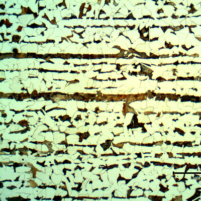 Micrography of the plate in a longitudinal section, presenting a typical ferritic pearlitic structure, banded.