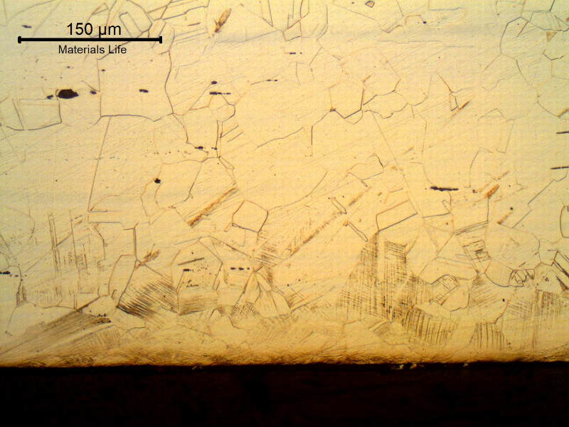 Nitronic 60 cylinder. Micrography of the longitudinal section close to the surface, presenting a fully austenitic microstructure, with a 0.15mm layer of strain hardened structure (deformation twins).