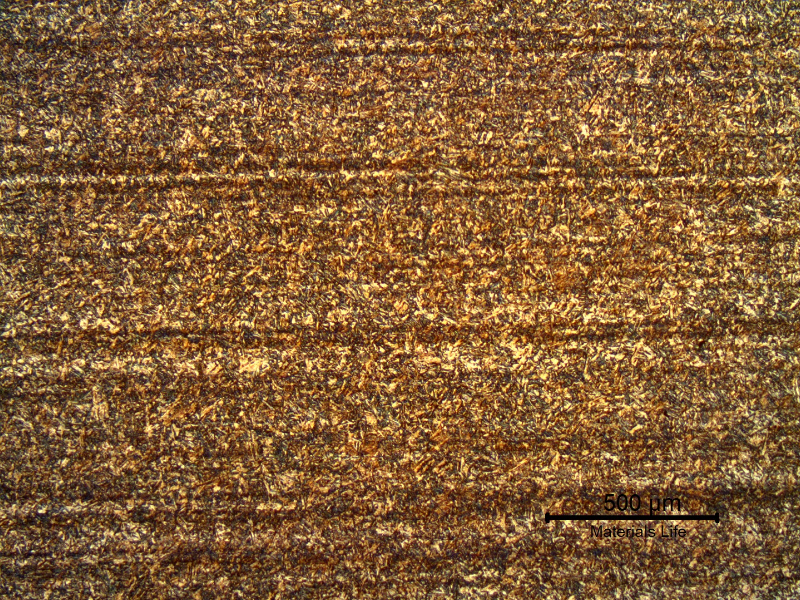 17-4 PH rod. Micrography of the longitudinal section in the center of the thickness, presenting an aged martensitic structure. The darker lines are bands of (sligthly) segregated regions. This material presents properties that correspond to the H1150 grade.