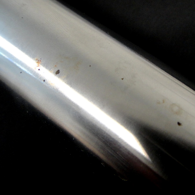 Aspect of the Nitronic 60 cylinder, OD 36.4mm, presenting pits at the external surface.