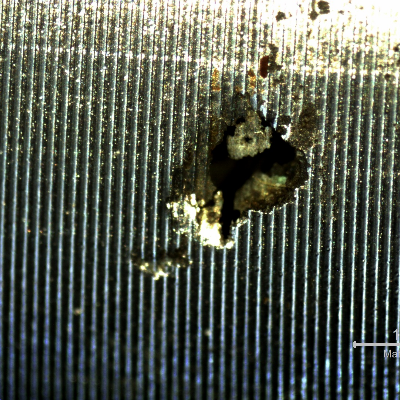 17-4 PH rod. Detailed aspect of the pitting in a low magnification microscope.