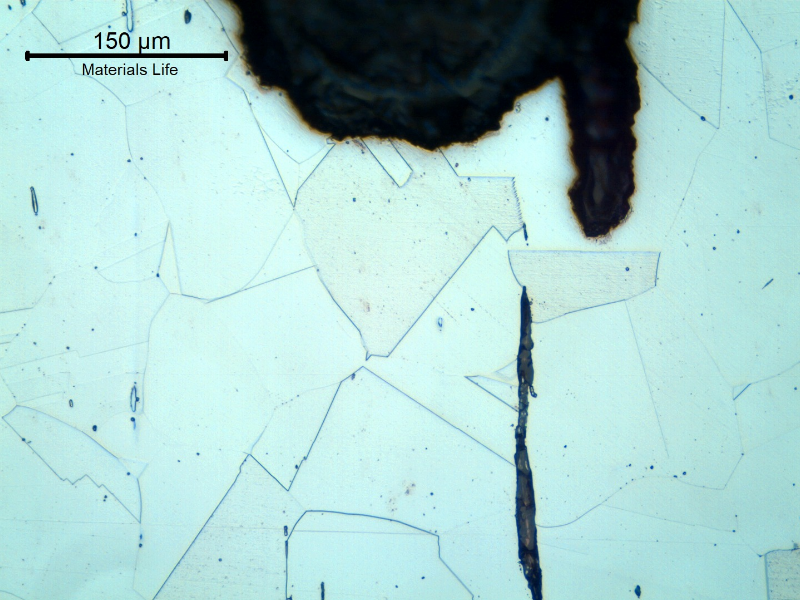Micrographic detail of the crevice corrosion in the case wall, showing that the structure is not affected and is fully austenitic with equiaxial grains typical of a solution annealed condition. Even non metallic inclusions did not accelerate corrosion since the extension of the inclusions was not too long and they were not connecting to others.