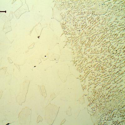 Micrographic detail of the fusion line of the welded joint of the padeye. The connector where the padeye was installed was welded to the case, but presented no evidences of corrosion.