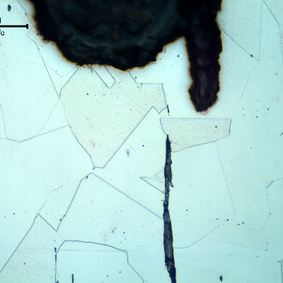 Micrographic detail of the crevice corrosion in the case wall, showing that the structure is not affected and is fully austenitic with equiaxial grains typical of a solution annealed condition.  Even non metallic inclusions did not accelerate corrosion since the extension of the inclusions was not too long and they were not connecting to others.