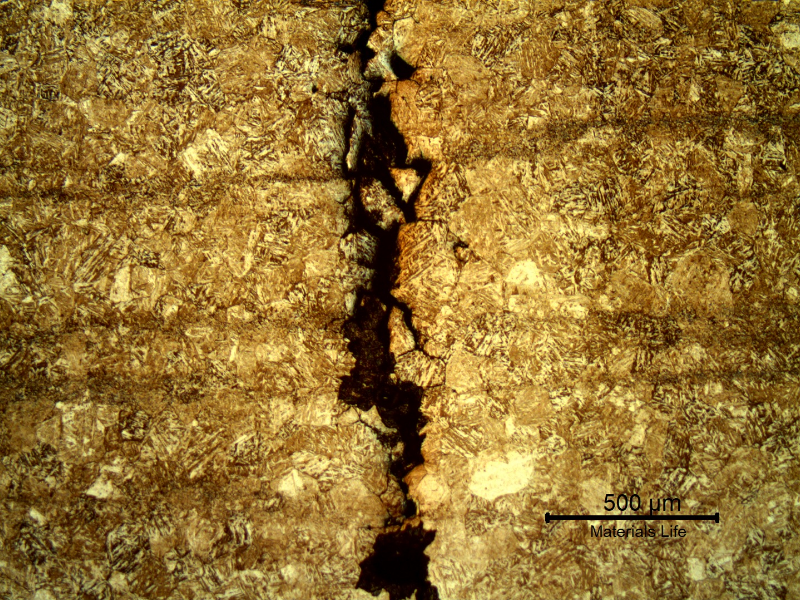 Micrography of a transverse section of the ring at the cracking position.  The cracks are intergranular and opened at the position close to the surface.
