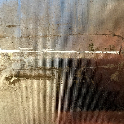 Macroscopic aspect of the crack in the valve ring surface. A leakage was detected during testing after 6 months out of service and the inspection identified several transverse cracks in the forged ring.  The valve was installed for one year, but it was not drained during the time it was out of service. The cracks were located in regions that were rusted and presenting a biological fouling.