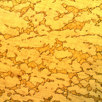 Micrographic detail of the non corroded region of the tubesheet presenting a microstructure of alpha (light yellow phase) and beta (orange phase).
