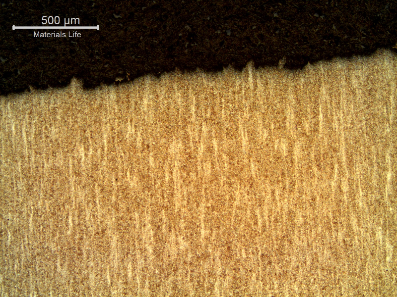 Micrography of the longitudinal section of the stud at the fracture (top of the figure) of a brittle aspect.