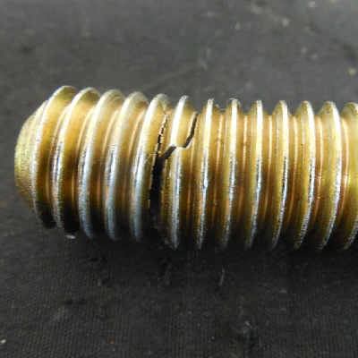 Allen stud, 1/2" nominal diameter, cadmium plated and chromate treated, cracked during assembling external parts in a gate valve.