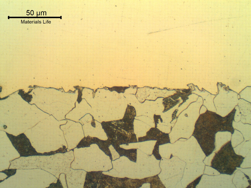 Micrography of the interface between the steel substrate and the first Ni layer. The Ni layer, 160 microns thick and 300HV hardness, is uniform and presents no discontinuities.