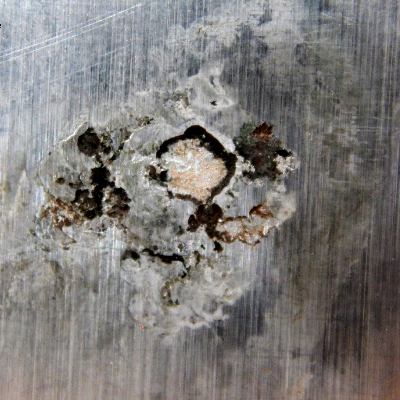Detail of the cylinder external surface, with deep dissolution as the worst damage morphology.