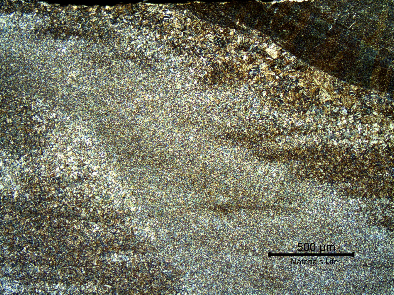 Micrography of the heat affected zone at the face of the joint. It is possible to see that even close to the fusion line the material was reheated in high temperature, suggesting that the temper bead was effective.