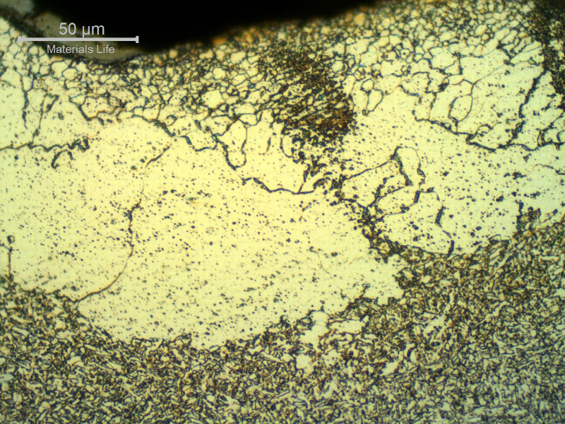 Micrographic detail of the weld metal with islands of a coarse ferritic structure, degradated (recristalized) from an acicular morphology during to the long heat treatment cycle in high temperature. The post welding heat treatment (PWHT) was conducted during 12 hours at 640°C.