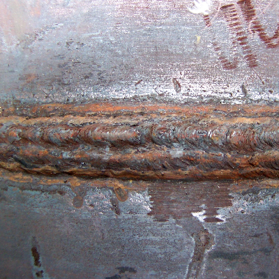 Aspect of the external surface of the tube, presenting the aspect of the cap and temper bead passes, after welding and heat treatment.