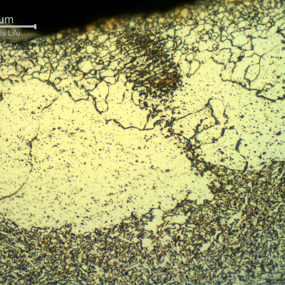 Micrographic detail of the weld metal with islands of a coarse ferritic structure, degradated (recristalized) from an acicular morphology during to the long heat treatment cycle in high temperature. The post welding heat treatment (PWHT) was conducted during 12 hours at 640°C.