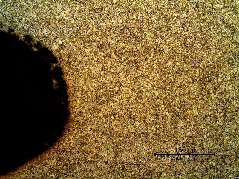 Micrographic aspect of the rolled thread that was heat treated later. Longitudinal section. The bolt was quenched and tempered to 30HRc and presented a martensitic structure.