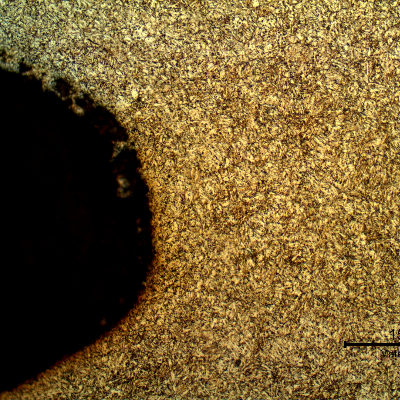 Micrographic aspect of the rolled thread that was heat treated later. Longitudinal section. The bolt was quenched and tempered to 30HRc  and presented a martensitic structure.