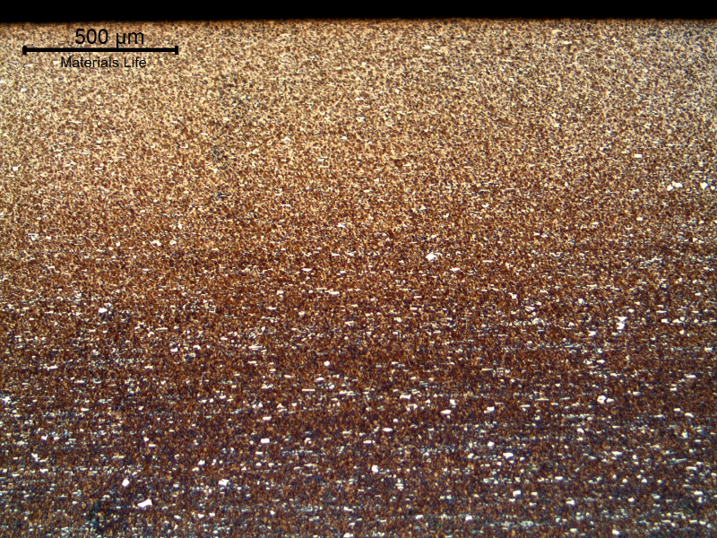 Micrography of an axial section of the roller bearing, at the external surface, where the hardness level was about 64 HRc (higher than the limit of 58HRc to 62 HRc).