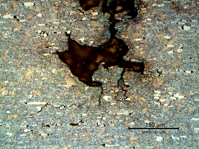 Micrographic details of the cracks at the interface.