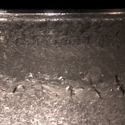 Aspect of the internal diameter surface presenting several cracks in the axial direction, caused by the contact with the shaft.  The roller bearing presented a too low hardness level (21 HRc average) in this ID position.