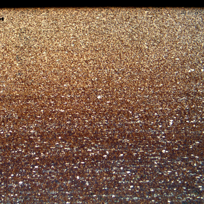 Micrography of an axial section of the roller bearing, at the external surface, where the hardness level was about 64 HRc (higher than the limit of 58HRc to 62 HRc).