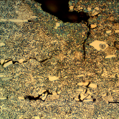Micrographic details of the cracks at the interface, most part of them associated to the ferritic structure.