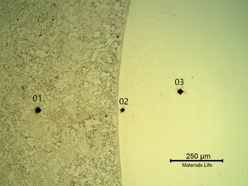 Micrography showing the positions of Vickers microhardness measurements in the longitudinal micrography, in the pipe steel substrate (dot 1 - 217 HV100g), very close to the interface inside the overlay (dot 2 - 370 HV100g) and a little far from the interface inside the Ni clad plate (dot 3 - 229 HV100g).