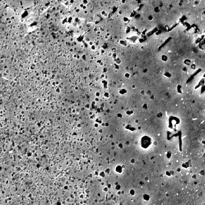 Image by scanning electron microscopy of the interface of the internally cladded pipe, seamless low alloy steel X70 overlaid with Alloy 625 (by automatic GTAW process) and presenting maximum iron content of 5% at the thickness of 3 mm (the qualified thickness).