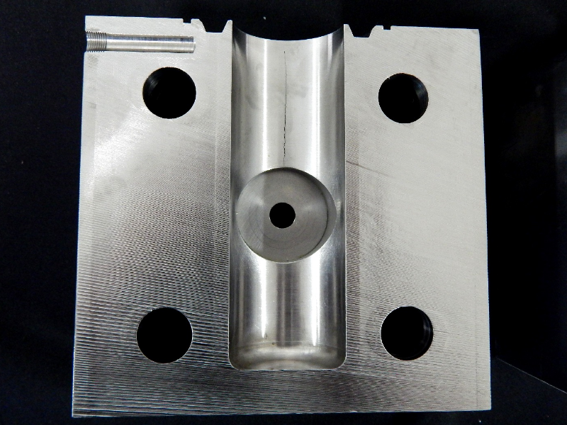 Aspect of a section cut transverse to the center of the body. The structure of the valve body was not uniform and close to the BX groove body face the structure was more degradated than in the bottom of the body, as it will be presented in the next figures.