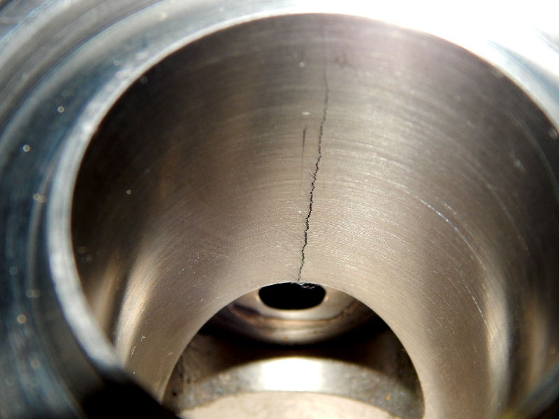 Detail of the internal bore, showing a brittle crack through the wall.