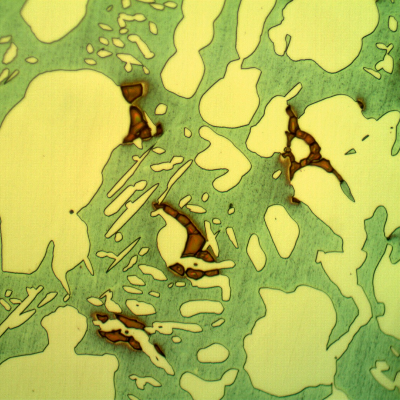 Micrographic detail of the valve body structure, far from the position where the cracking has occurred, in the bottom of the body.  The structure is ferritic austenitic, with some sigma phase, not in a large amount, indicating the valve structure was not uniform.