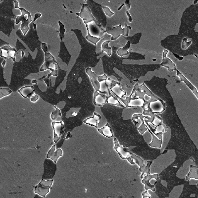 Micrographic details by scaning electron microscopy.  The structure is ferritic austenitic, with a large amount of detrimental phases associated to the ferritic structure, probably sigma phase.