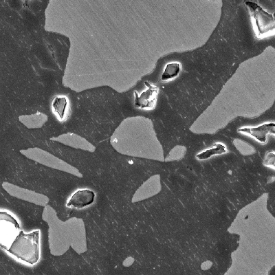 High magnification details by scaning electron microscopy.  The structure is ferritic austenitic, with a large amount of detrimental phases associated to the ferritic structure, probably sigma phase.