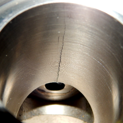 Detail of the internal bore, showing a brittle crack through the wall.