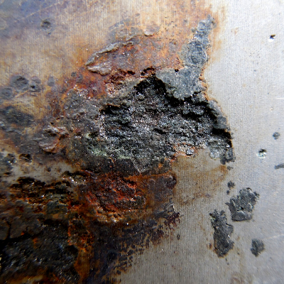 Aspect of the internal side of the drilling tool, after cleaning for inspection. Several regions of corrosion where detected where the drilling mud was adhered and remained for a period a little longer than 1 month. This tool is a high strength steel, cold worked.