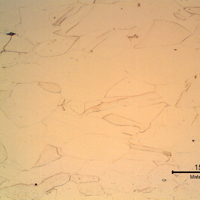 Optical micrography of the longitudinal section of the drill collar, in the center of the thickness, presenting slightly elongated grains of fully austenitic microstructure, cold worked.