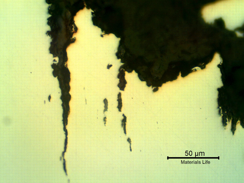 As polished micrography of the longitudinal section of the stud at the cracking transverse to the axis. It looks like inclusions/possible banding regions are contributing for the cracking.