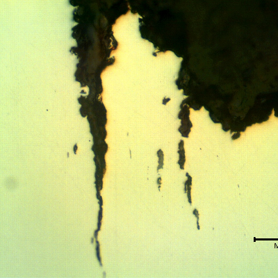 As polished micrography of the longitudinal section of the stud at the cracking transverse to the axis. It looks like inclusions/possible banding regions are contributing for the cracking.