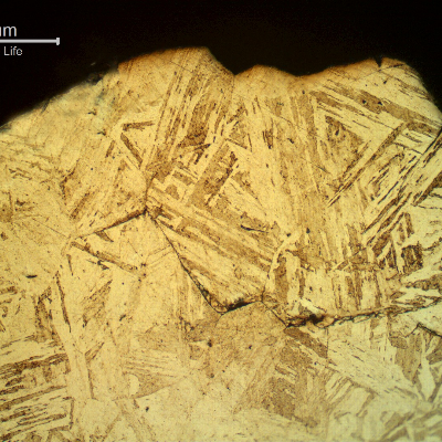 Micrographic detail of the intergranular morphology of the fracture surface, in the starting point of the failure.