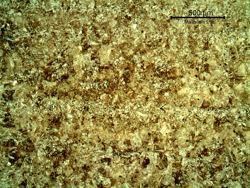 Micrography of the high strenght steel, heat treated, of the casting device. The microstructure is bainitic martensitic.